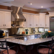 kitchen remodel with white cabinets, granite countertops, stainless hood and appliances | Marchand Creative Kitchens Cabinets New Orleans Metairie Mandeville LA